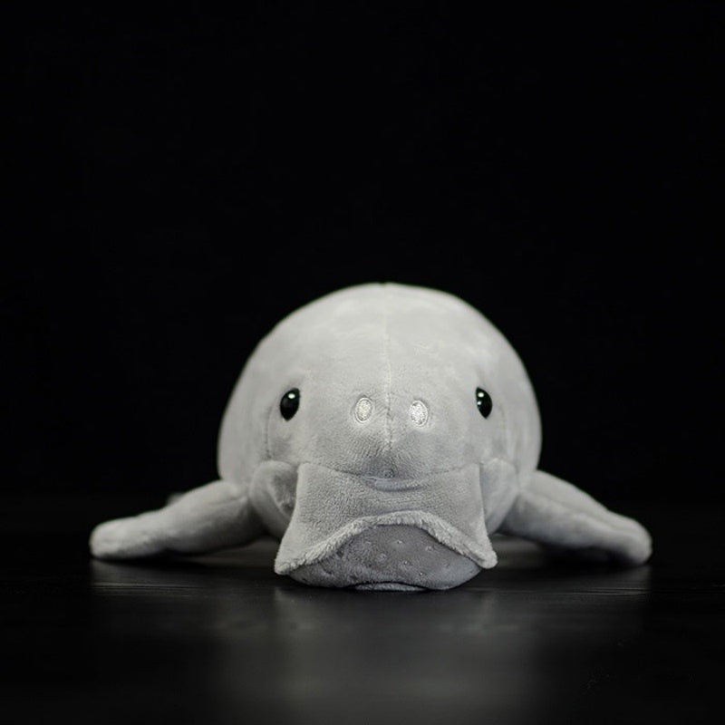 Front view of the dugong plush toy showcasing its adorable face and detailed stitching
