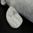 Zoomed-in view of the dugong plush toy's flipper, featuring a soft and huggable texture