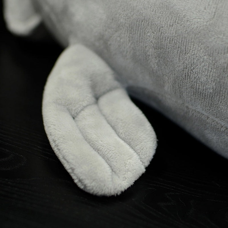 Zoomed-in view of the dugong plush toy's flipper, featuring a soft and huggable texture