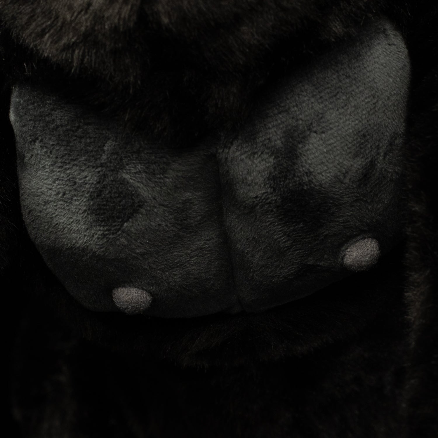 Zoomed-in view of the silverback gorilla plush toy’s chest, highlighting its soft and realistic texture