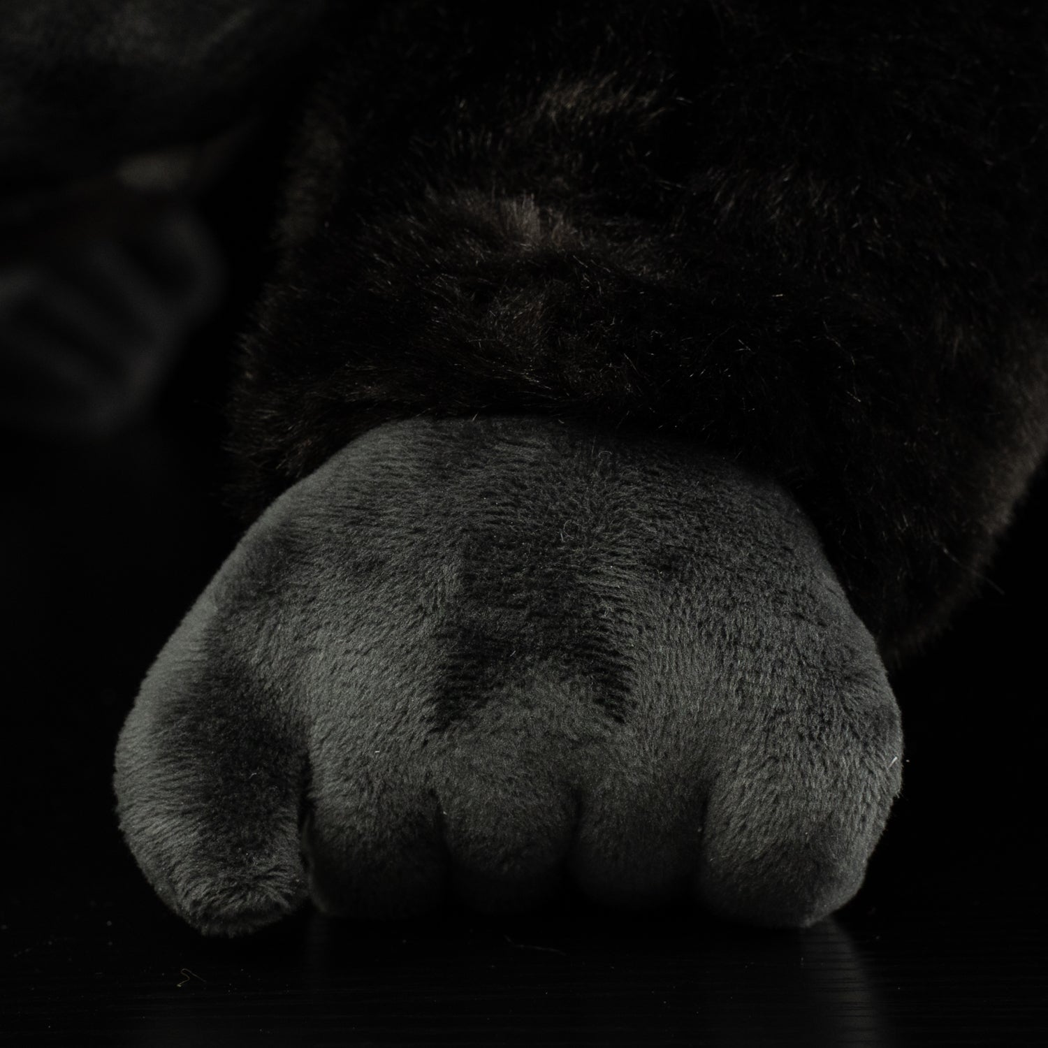 Close-up of the silverback gorilla plush toy’s hand, showcasing its detailed and soft design