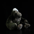 Side view of the adorable and realistic Hanging Silverback Gorilla plush toy for kids and collectors