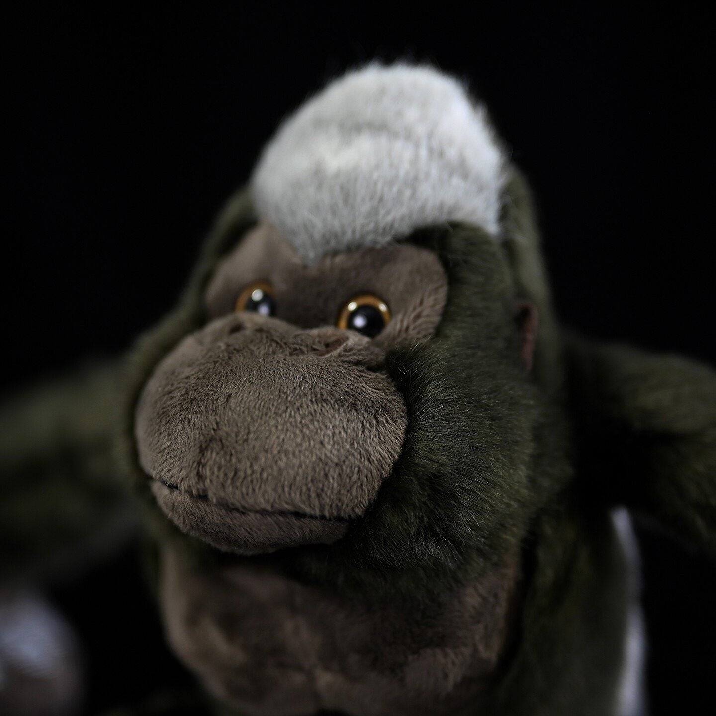 Close-up of the Silverback Gorilla plush's detailed face, with lifelike eyes and soft texture by SoftDaysLab