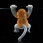 Back view of hanging Proboscis Monkey plush, showcasing its detailed fur and jungle-inspired design