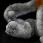 Foot details of the cuddly Proboscis Monkey plush, complete with soft fur and lifelike craftsmanship