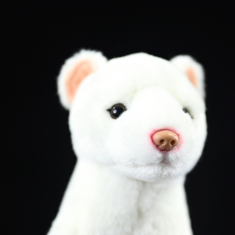 Close-up of an ermine plush toy’s adorable face with pink nose and black eyes by SoftDaysLab