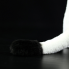 Close-up of the black-tipped tail of a realistic standing ermine plush toy by SoftDaysLab