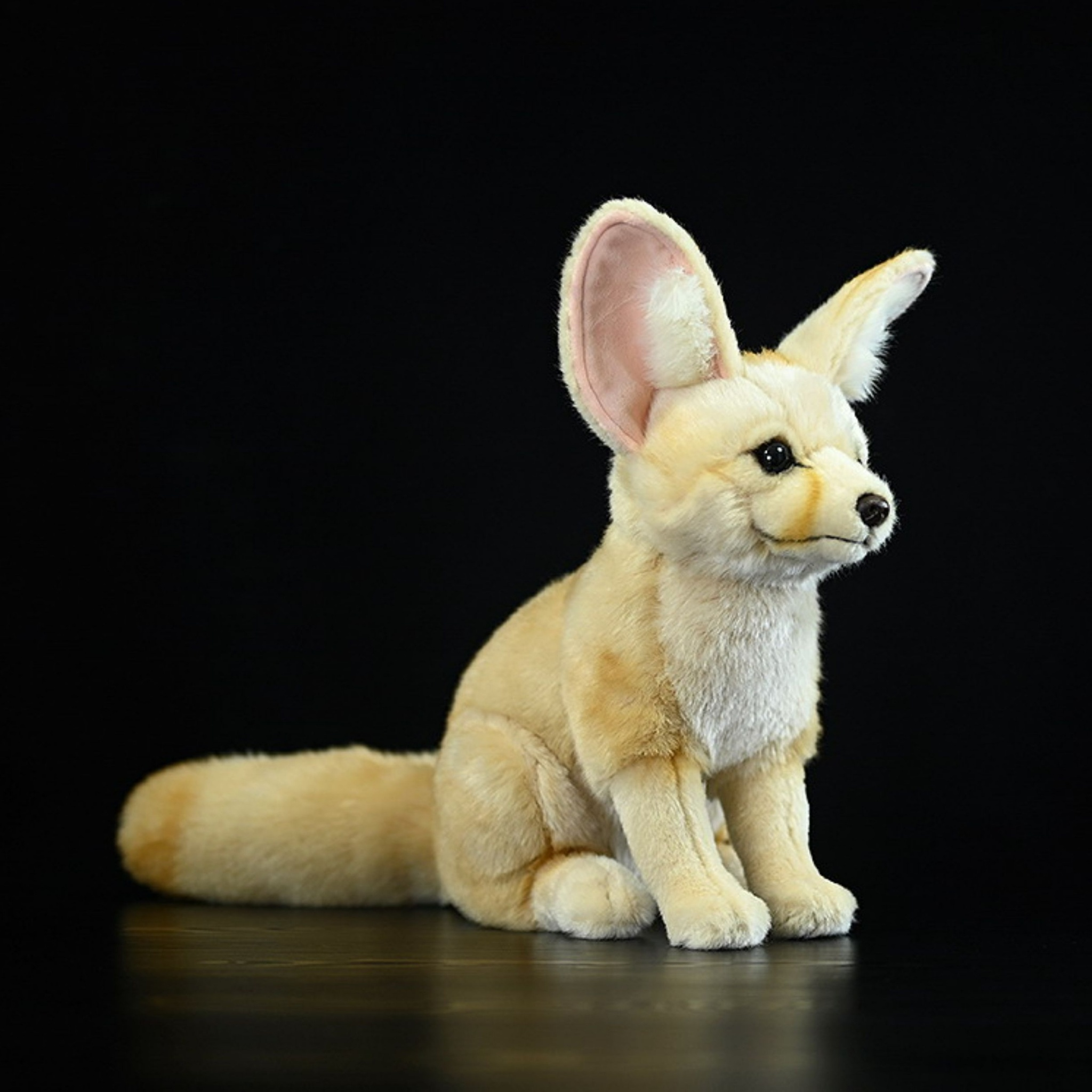 Angled view of a cute fennec fox plush toy with realistic fur and charming expression by SoftDaysLab