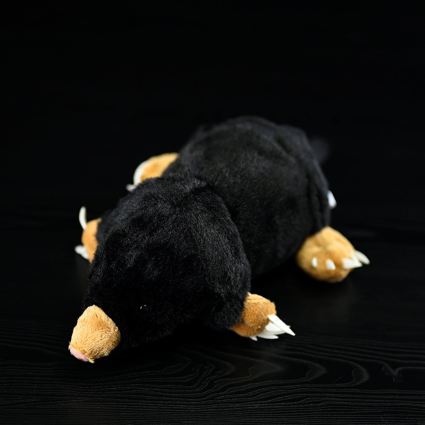 Lifelike Adorable mole plush toy featuring realistic black fur and tiny, intricate claws