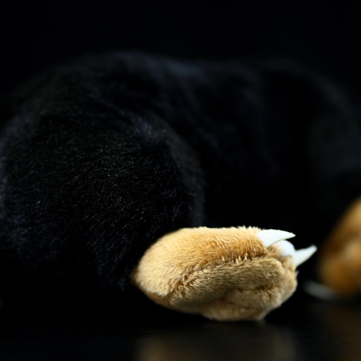 Detailed view of the mole plush toy's fur and paw, showcasing its high-quality craftsmanship