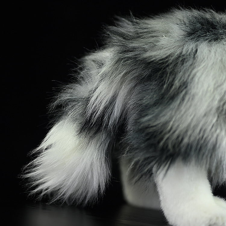 Tail close-up of Blue Merle Border Collie plush, featuring fluffy and realistic fur texture