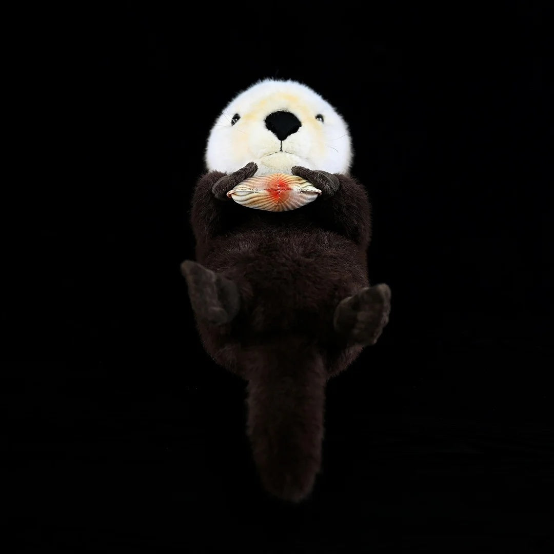 Front view of SoftDaysLab® floating sea otter plush, showing its soft belly and vibrant clam detail