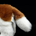 Tail close-up of the Saint Bernard plush toy, highlighting its fluffy tail and fine stitching by SoftDaysLab