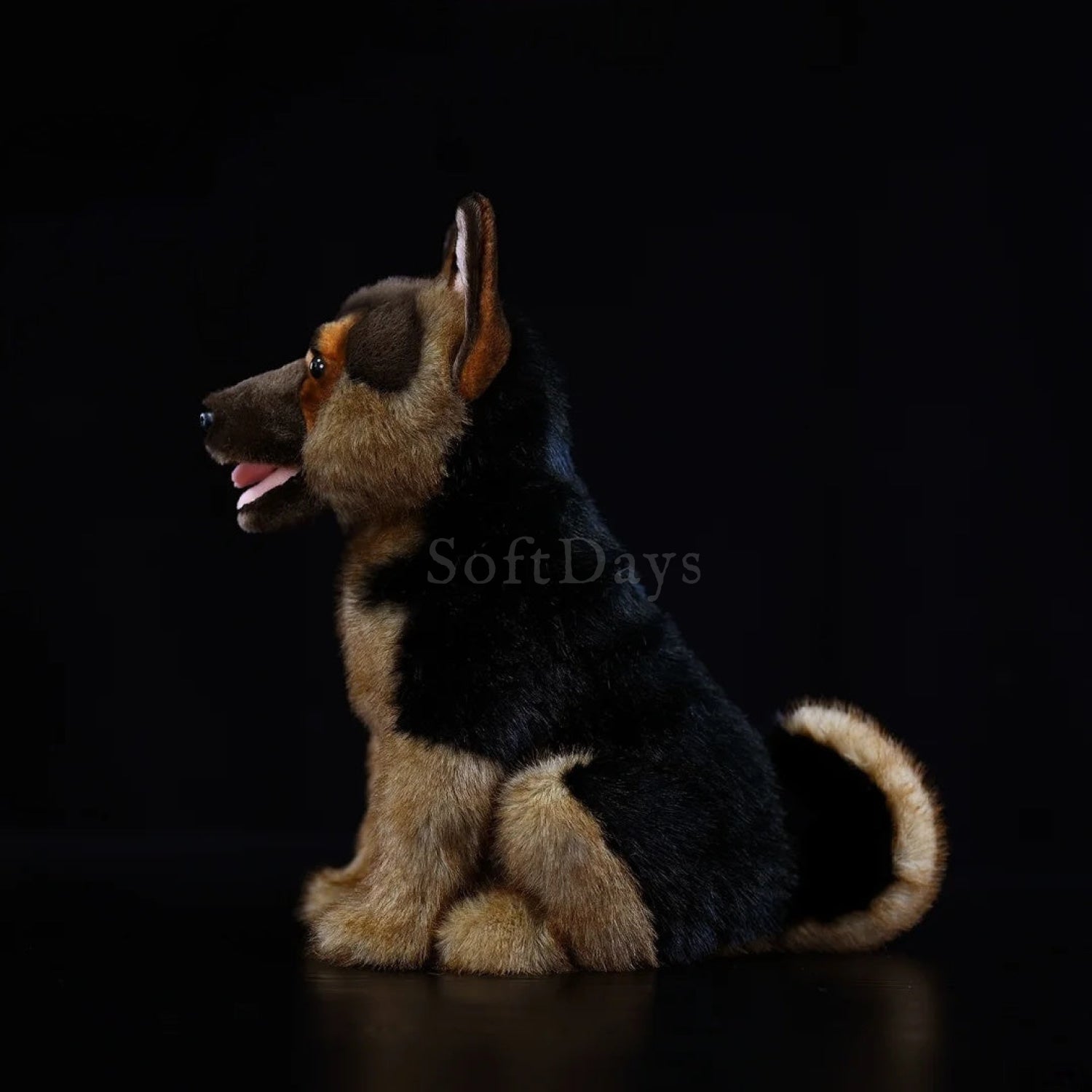 Side view of a German Shepherd dog plush toy sitting, showing realistic fur texture and upright ears