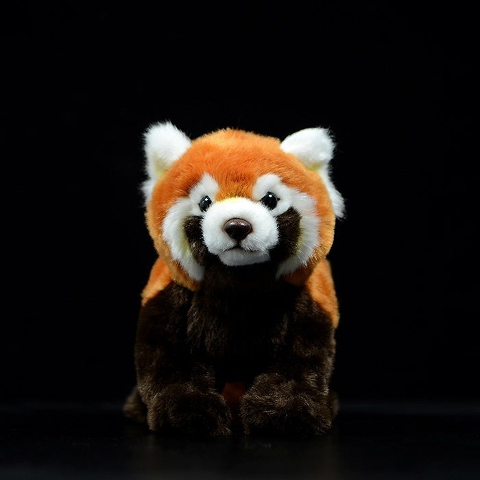 Front view of a lifelike red panda plush toy showcasing its adorable face and detailed craftsmanship