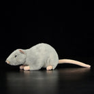 Side profile of a lifelike grey mouse plush toy, showcasing its realistic tail and delicate craftsmanship