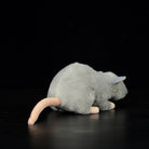 Rear view of the grey mouse plush toy, highlighting its soft fur and realistic tail placement
