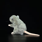 Rear side view of a standing grey mouse plush toy, featuring its detailed tail and soft texture