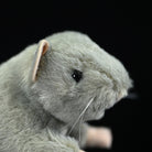 Close-up of the standing grey mouse plush toy’s face, showcasing its lifelike whiskers and cute nose