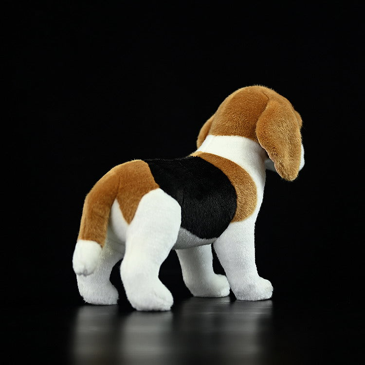 Rear view of a tricolor Beagle plush toy showing its detailed coat and lifelike posture
