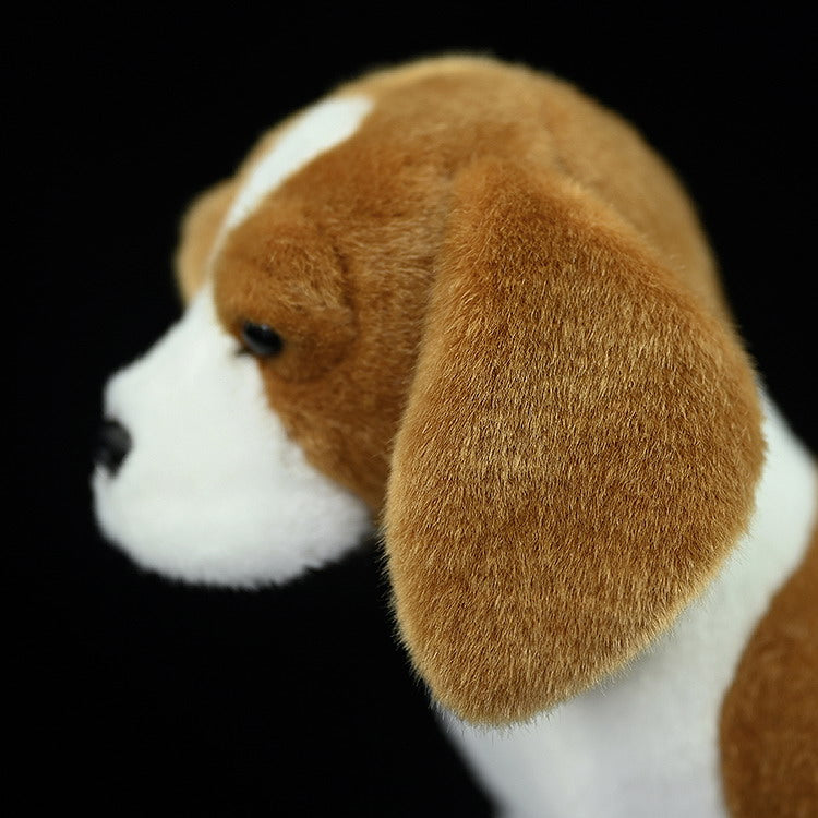 Close-up of the Beagle plush toy's ear, highlighting its soft texture and lifelike design