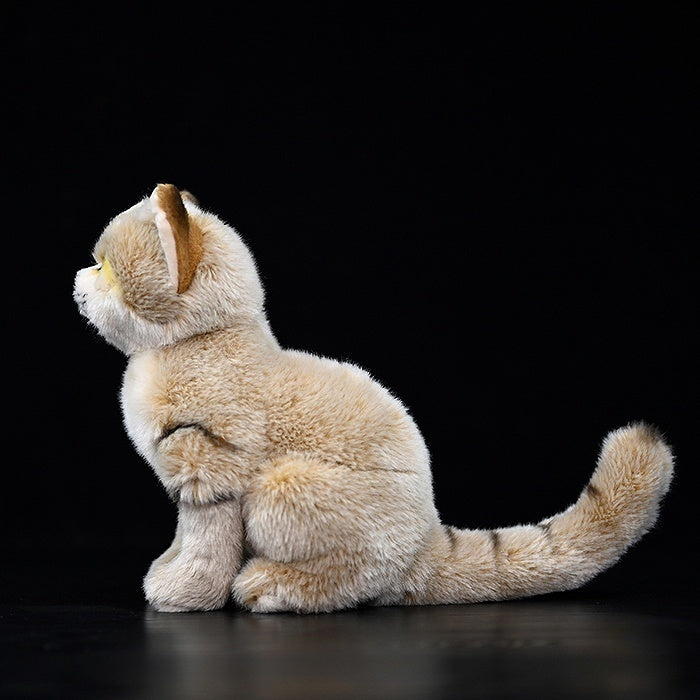Side profile of sand cat plush toy, featuring lifelike fur and desert-inspired design by SoftDaysLab