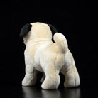 Rear view of a fawn pug stuffed animal, highlighting its curled tail and soft, detailed texture