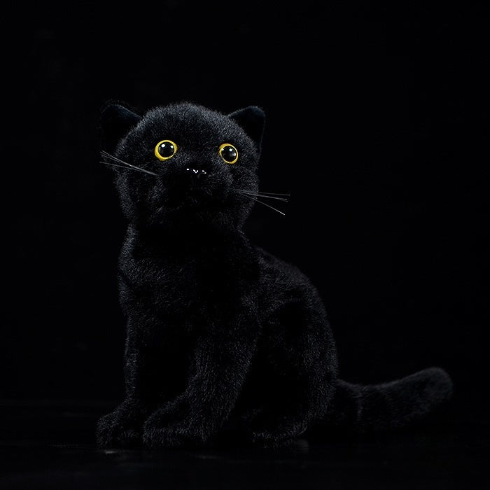 Realistic black cat plush toy with lifelike yellow eyes, perfect for cat lovers and collectors