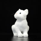 White cat plush toy sitting upright, detailed with a soft coat and captivating blue eyes