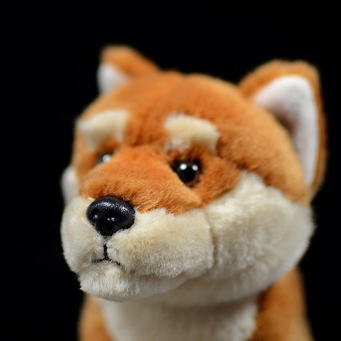 Close-up of a Shiba Inu plush face with detailed features, soft fur, and lifelike expression for dog lovers