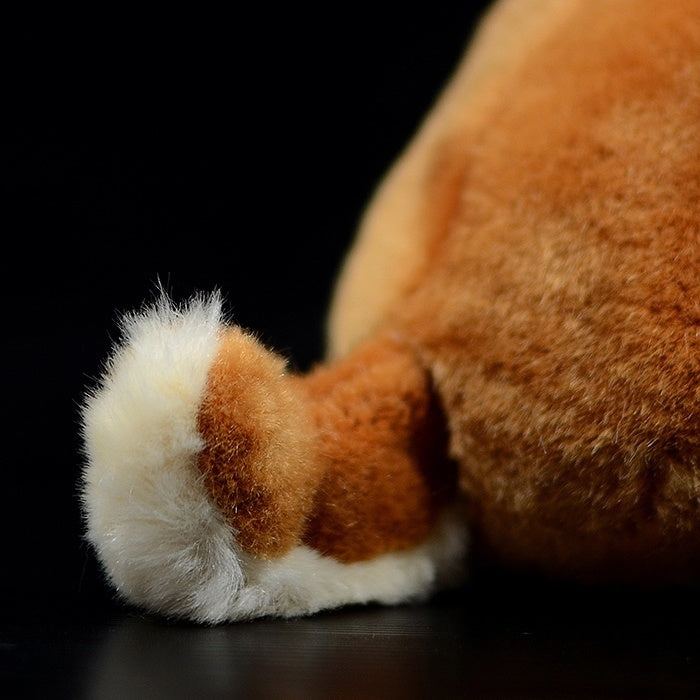 Fluffy tail of a Shiba Inu plush toy, showcasing realistic design and premium-quality soft material