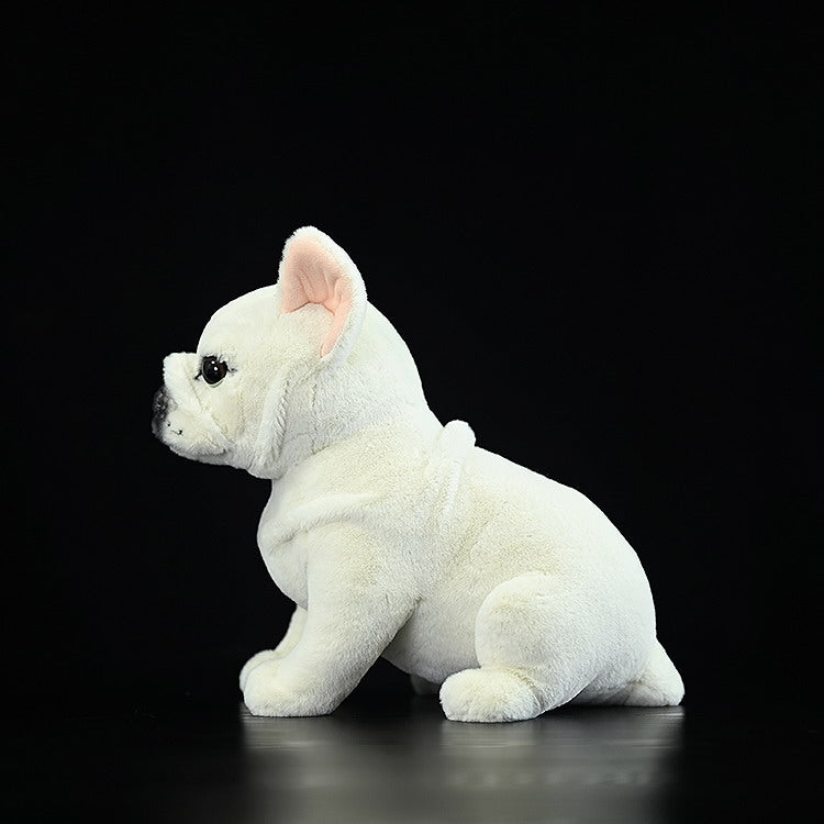Side profile of a cream French Bulldog plush toy showcasing realistic design and adorable sitting posture