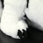 Zoomed-in image of the Southern Tamandua plush toy’s tail, highlighting its fluffy and soft texture