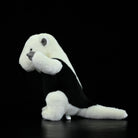 Side view of a Southern Tamandua plush toy, featuring its prehensile tail and soft texture