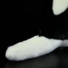 Zoomed-in image of the Southern Tamandua plush toy’s tail, highlighting its fluffy and soft texture