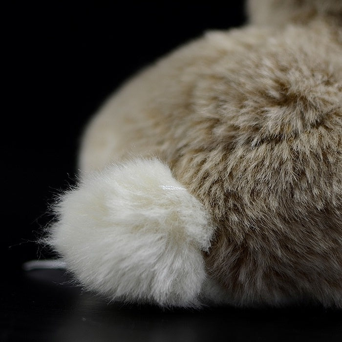 Fluffy white tail of the brown hare rabbit plush toy, a charming feature for animal lovers by SoftDaysLab