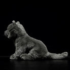 Profile view of British Blue Shorthair plush, highlighting its soft fur and realistic sitting pose