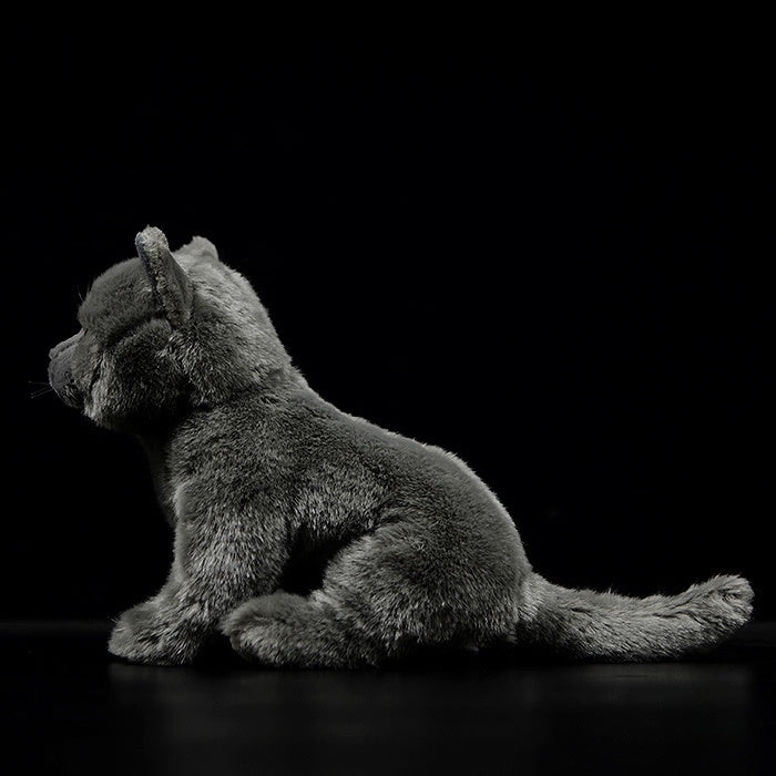 Profile view of British Blue Shorthair plush, highlighting its soft fur and realistic sitting pose