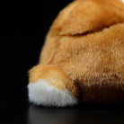 Detailed view of plush bunny’s tail with golden and white fur, showcasing soft craftsmanship by SoftDaysLab