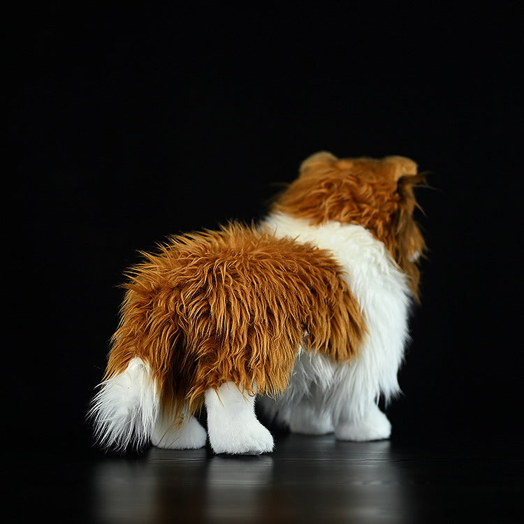 Rear view of a Shetland Sheepdog plush toy, highlighting its realistic fur and fluffy tail for Sheltie fans