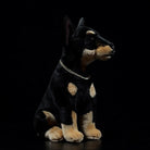 Side view of SoftDaysLab Doberman stuffed animal with elegant black and tan details and chain collar