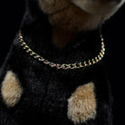 Gold chain detail on the realistic Doberman plush, adding elegance to its lifelike design