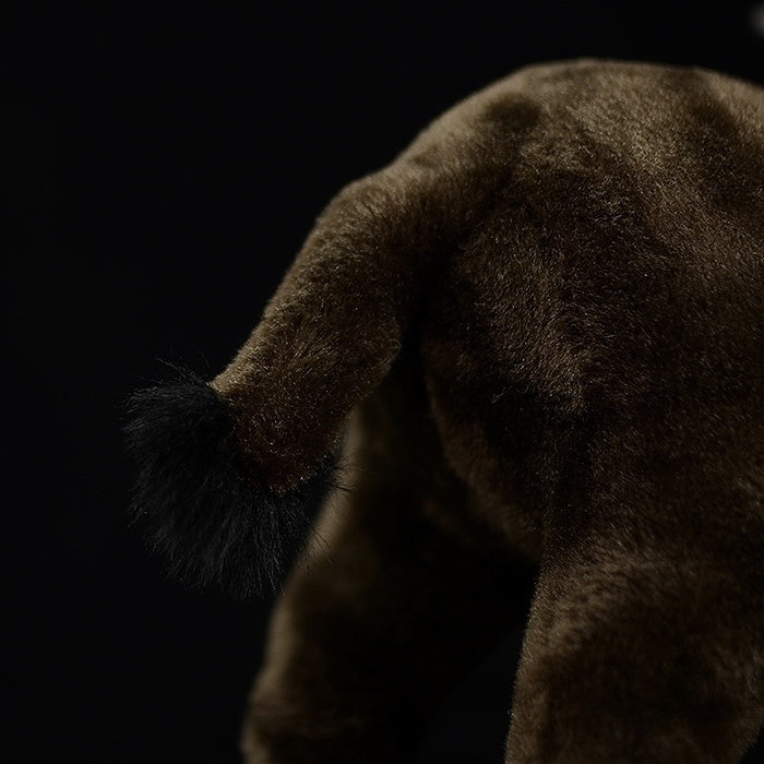 Close-up of a lifelike water buffalo plush toy’s detailed tail, crafted with soft and realistic materials