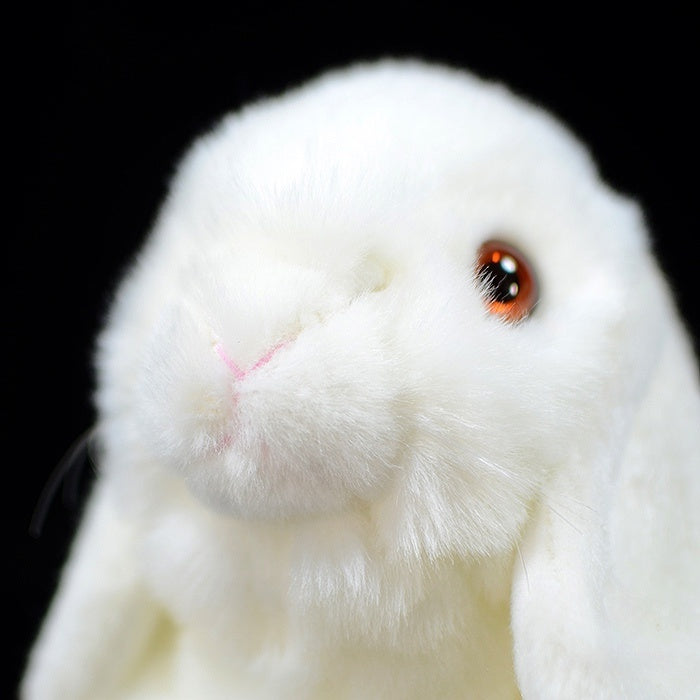 Detailed view of the white lop-eared rabbit plush’s nose and eyes, soft and adorable for animal lovers