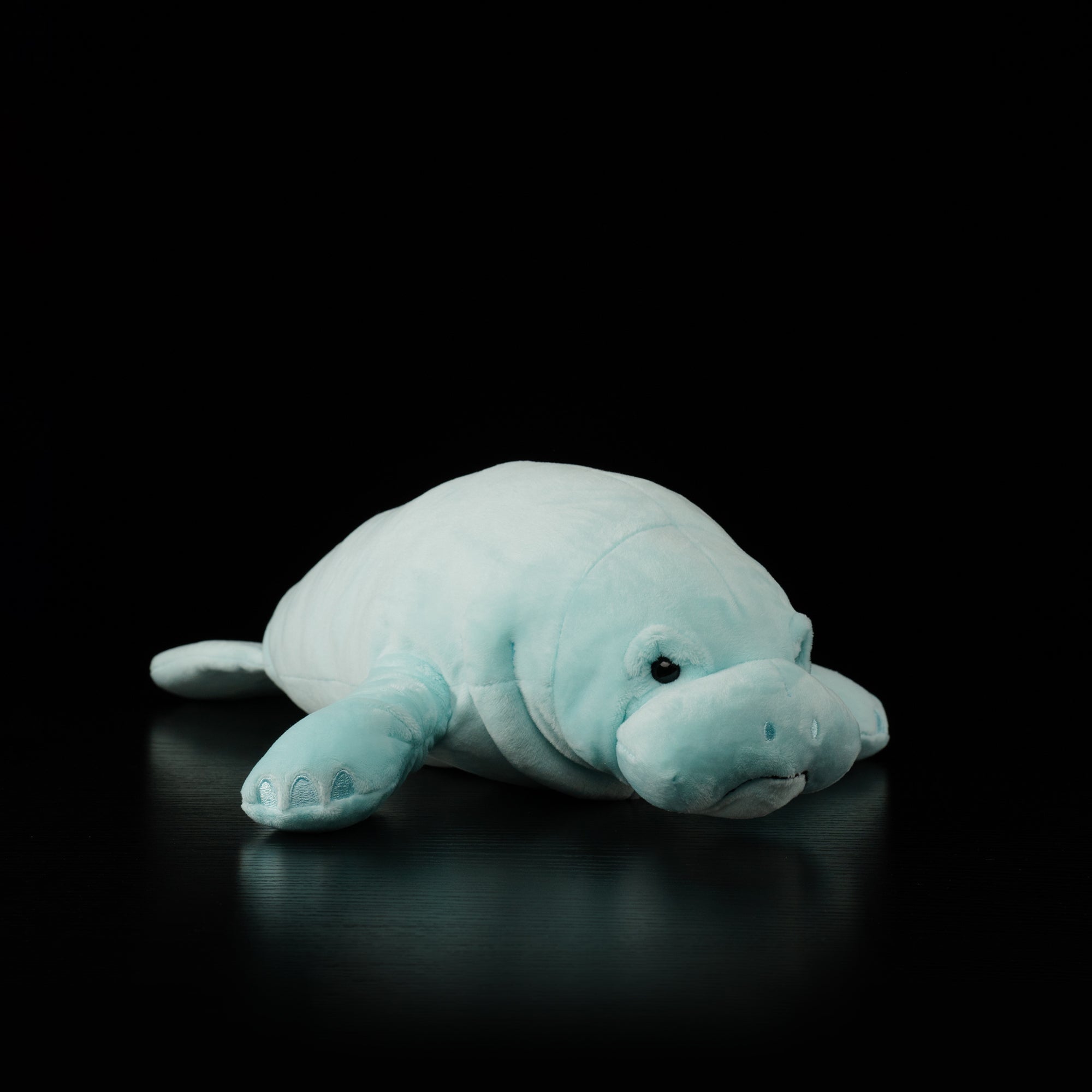 Angled side view of manatee stuffed toy by SoftDaysLab®, perfect for sea cow and marine life enthusiasts