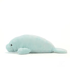 Side profile of a manatee stuffed animal, showcasing its lifelike shape and smooth texture