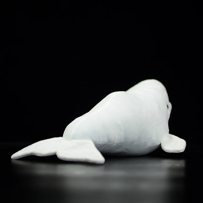 Back view of a beluga whale plush toy, showcasing its smooth tail and soft material