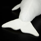 Tail fin of a beluga whale plush toy with smooth and soft fabric, ideal for marine-themed collections