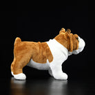 Side profile of a detailed English Bulldog plush toy, showcasing its realistic design and soft texture