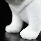 Close-up of a soft English Bulldog plush paw, highlighting its premium craftsmanship and lifelike design
